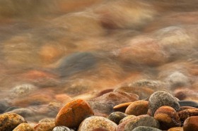 Wave over beach rocks RO8286 Wave over beach rocks RO8286